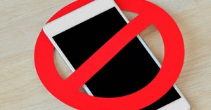 Extending Mobile Phone Bans to Schools: A Call for Consistent Child Safeguarding
